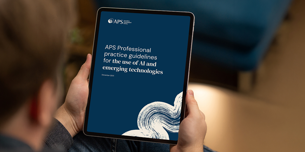 An iPad with the resource 'APS Professional practice guidelines for the use of AI and emerging technologies' on screen